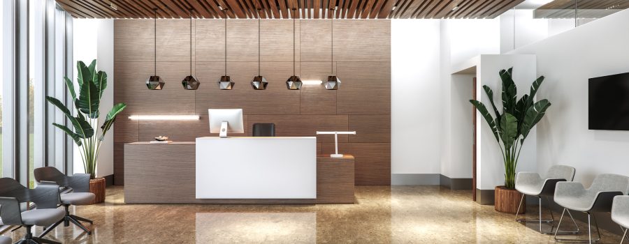 3D render of the interior lobby of a modern office / healthcare clinic. The floor is glossy beige marble, reflecting ambient lighting from hanging pendant lights. A sleek reception desk made of dark wood is present with copy space.